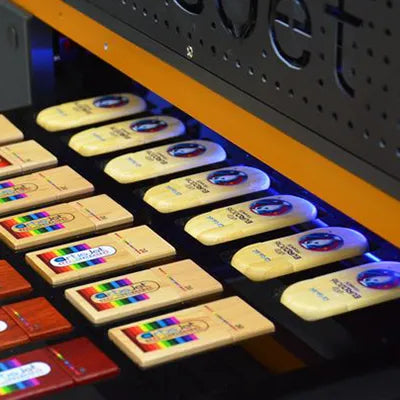 Colorfully printed wooden USB drives on a UV Printing machine