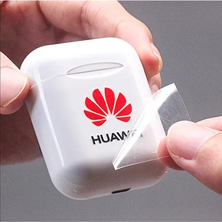Peeling off a DTF Transfer Film Printing of Huawei logo on a earbud case
